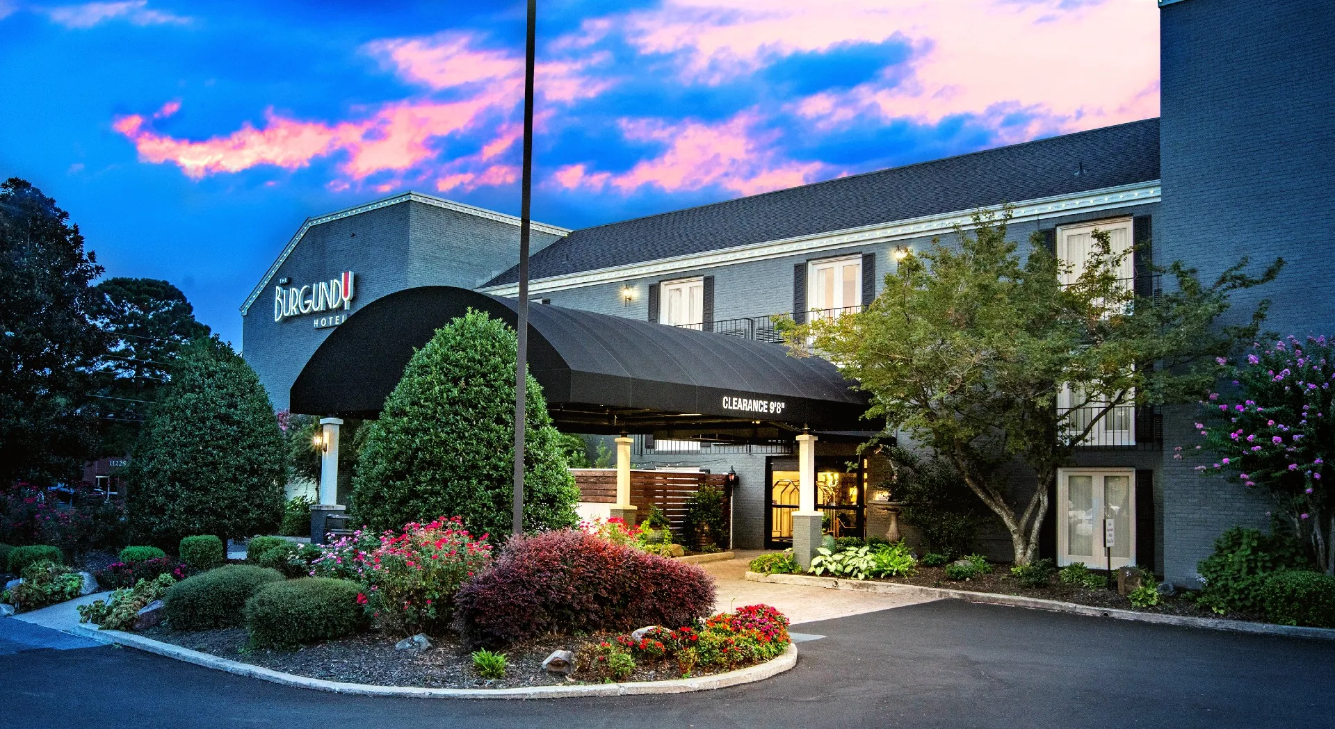 The Burgundy Hotel exterior at dusk