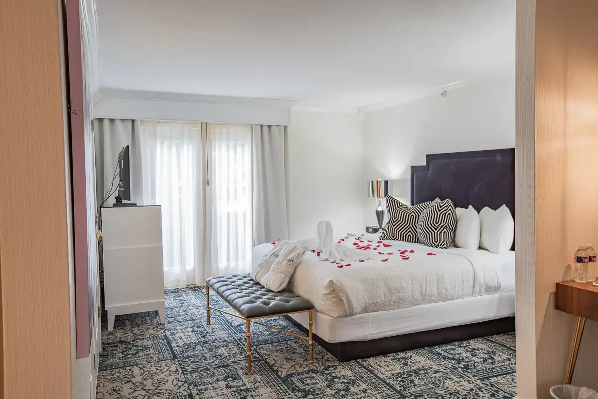 Suite bedroom prepared for a special stay at The Burgundy