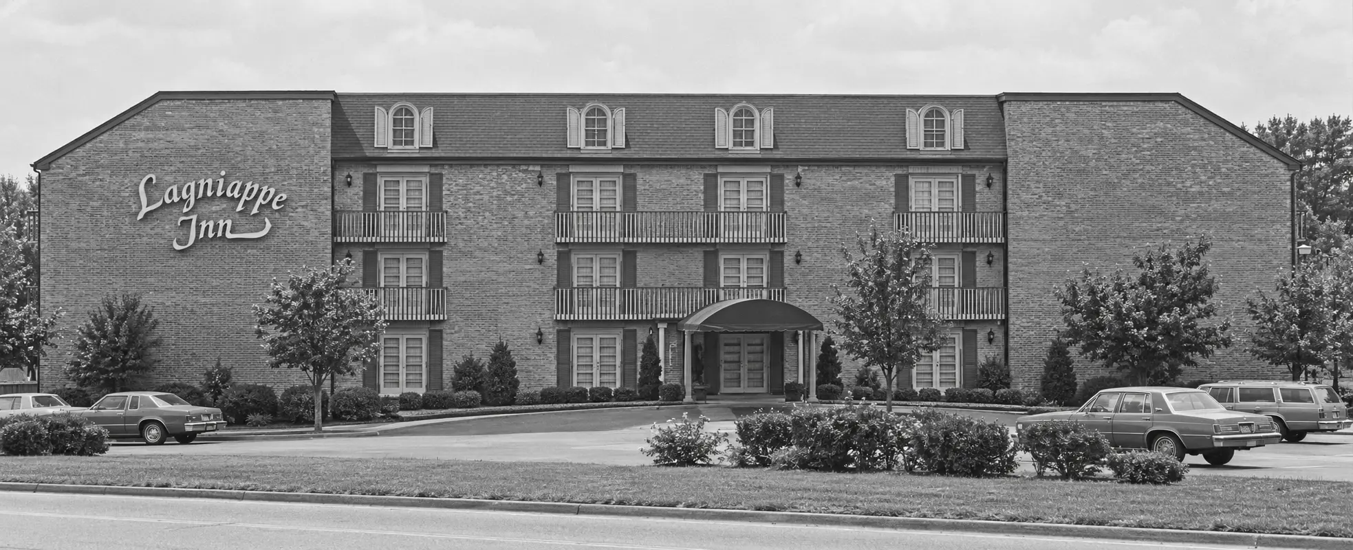 Artist's black-and-white reconstruction of the original Lagniappe Inn