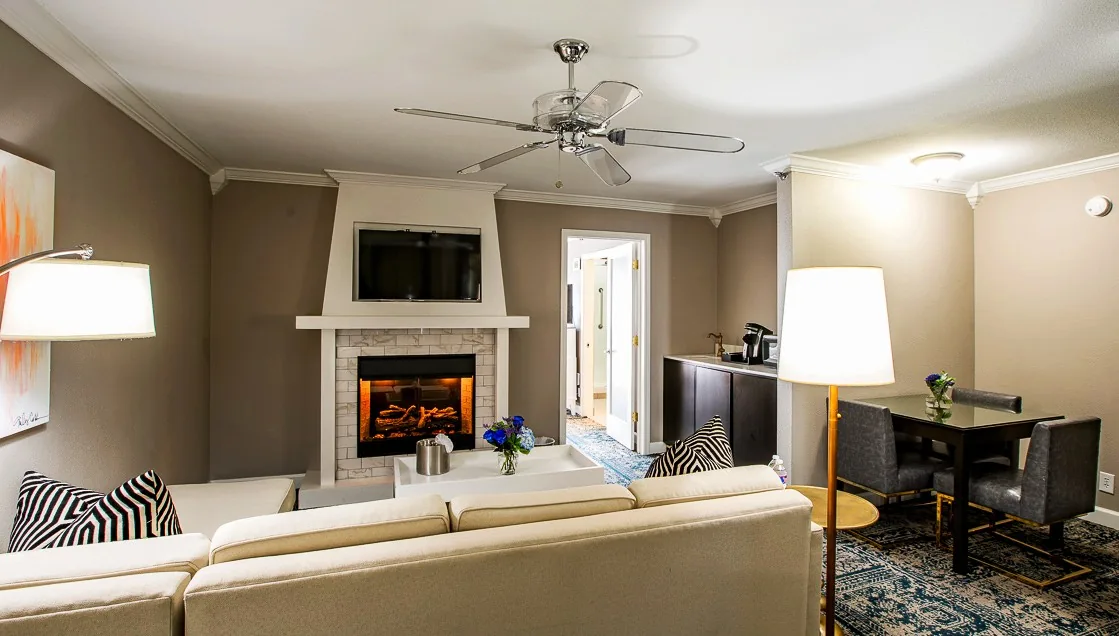 Presidential Suite living room with fireplace
