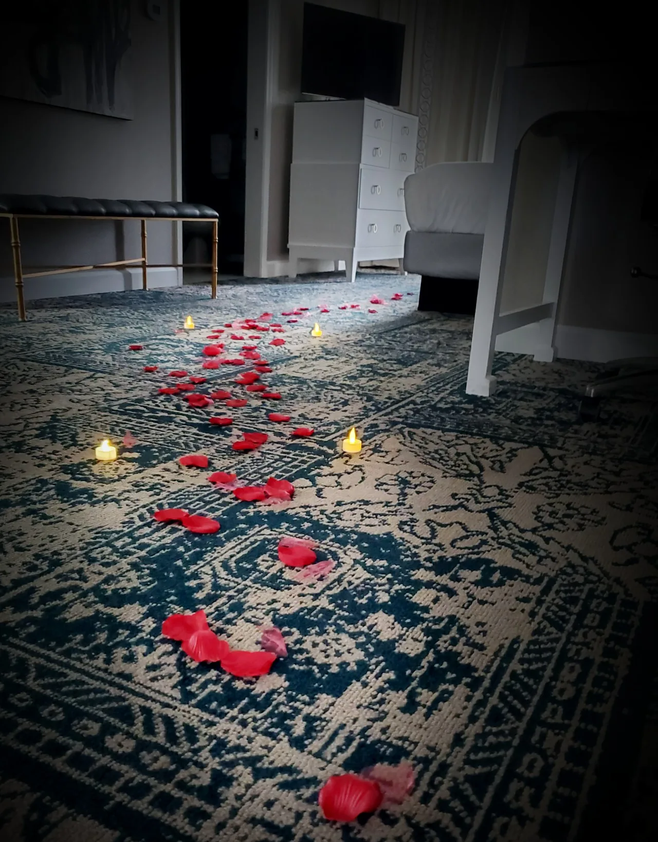 Rose-petal pathway in a guest suite